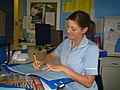 Staff Nurse Andrea writing up her notes