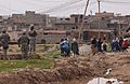 Iraqi police, U.S. Soldiers patrol neighborhood in Mosul DVIDS40282