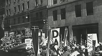 May Day parade with banners and flags, New York (cropped)