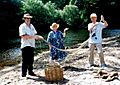 Releasing a Scrub python back to the wild, near Cooktown. 1999