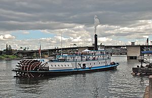 Sternwheel steam tug Portland approaching dock in Portland (2012).jpg