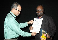 The Director of DFF, Shri Bhupendra Khaintola felicitated the Director, Shri Lenin Rajendran, at the presentation of the film (Makaramanju), in the INOX Cinema Hall, during the IFFI-2010, in Panjim, Goa on November 27, 2010