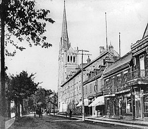 The church and Rue St. Charles, Longueuil, QC, about 1910