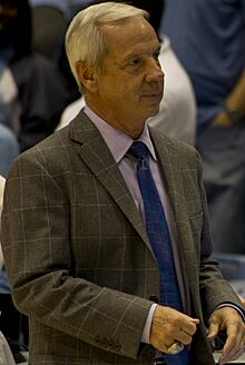 US Navy 111027-N-QF368-439 Roy Williams, head coach of the University of North Carolina basketball team, walks out to his team during an exhibition (cropped)