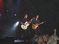 Jim Suhler performing with George Thorogood