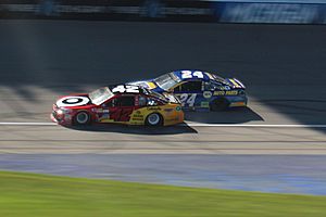 Larson and Chase Elliott Battle for the lead in the Firekeepers 400.