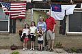 Oklahoma Gov. Mary Fallin, second from right, stands with a family that survived the May 20, 2013, tornado in Moore, Okla., May 28, 2013 130528-Z-VF620-4765