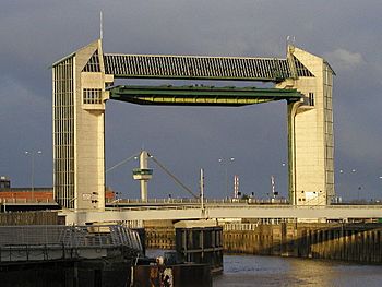 A large lifting structure, providing a tidal barrier over a river