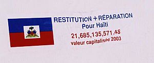Sticker demanding reparations for Haiti, Port au Prince, 2003