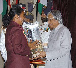 The President Dr. A.P.J. Abdul Kalam presenting the Arjuna Award -2005 to Ms. Dola Banerjee for Archery, at a glittering function in New Delhi on August 29, 2006