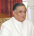 The Prime Minister, Dr. Manmohan Singh with the Governor of Chhattisgarh, Lt. Gen. (Retd.) K. M. Seth at Raj Bhawan in Raipur, during his one day visit to the State on April 30, 2005 (cropped)