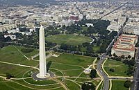Aerial view of the obelisk with the White House in the background