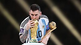 221218184732-messi-wc-trophy