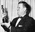 George Stevens with Oscar for Giant (cropped)