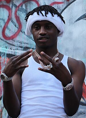 Lil Tjay on set (cropped 2).jpg