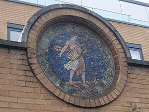 Mosaic roundel at Octavia House in Red Cross Garden, London