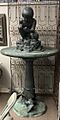 Sculpture of Boy with Shell on a Pedestal by Bashka Paerr