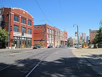 Photo of several three-story brick buildings