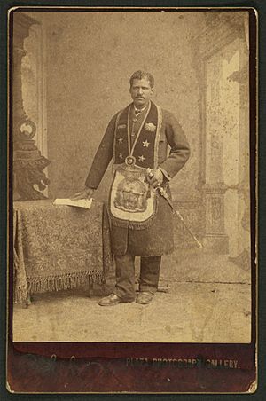 African American man, member of the Grand United Order of Odd Fellows, wearing fraternal order collar and apron) - A.C. Golsh, 411 Main St., opp. Pico House, Los Angeles, Cal LCCN2010652112
