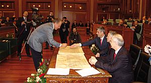 Behgjet Pacolli signing the Kosovo declaration of Independence