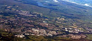 An aerial photo showing Abronhill and Whitelees in Cumbernauld. Westfield, Kilsyth and the Carron Valley Reservoir are also shown.
