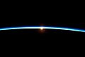 Thin Line of Earth's Atmosphere and the Setting Sun