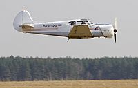 Yak-18t in flight (4546272866)