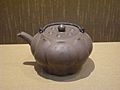 “Zisha”lotus-shaped teapot with silver handle