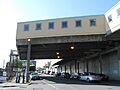 06 Pike Place Market Desimone bridge with vendors inside on Western Avenue facing north