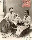 Ao ngu than on postcard dated 1904