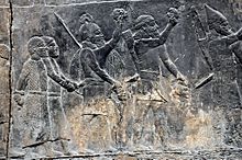 Relief depicting Assyrian soldiers and their prisoners