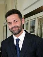 George and Laura Bush with Khaled Hosseini in 2007 detail2