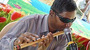 Playing flute in Tamilnadu