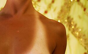 Tan lines on human female chest