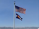 United States and Colorado Flags over Colorado State Capital