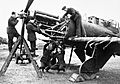 Fitters working on the Rolls-Royce Merlin engine of a Boulton Paul Defiant of No. 125 Squadron RAF at Fairwood Common, Wales, January 1942. CH4607
