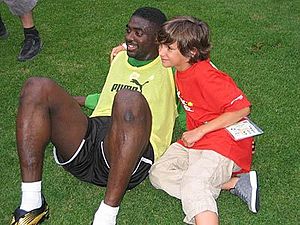 Toure With a Young Fan