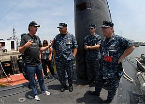 US Navy 100722-N-7705S-096 Actor Tim Allen talks with Sailors aboard the Los Angeles-class attack submarine USS Scranton (SSN 756) during a tour of the ship