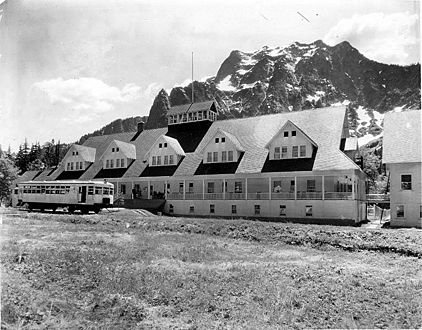 Exterior of Big Four Inn with rail car, near Monte Cristo, Snohomish County, Washington, ca 1923 (WASTATE 674)