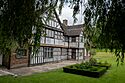 Ford Green Hall framed by tree.jpg