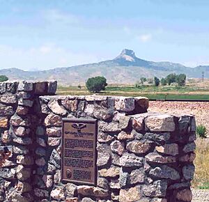 Heart mountain marker with mountain behind