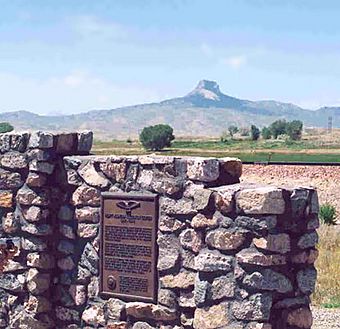 Heart mountain marker with mountain behind.jpg