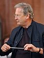 John Eliot Gardiner at rehearsal in Wroclaw cropped portrait