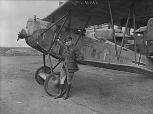 Major A.E. McKeever, Commanding Officer, No. 1 Squadron, C.A.F. with captured Fokker D. VII aircraft of the German Air Force, Upper Heyford, Oxon., 1919