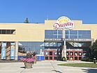 Front entrance of brick and glass building. Sign near roof top says Minnesota Discovery Center.