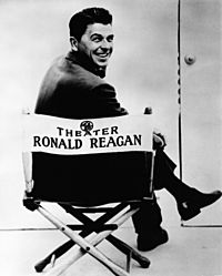 Publicity photograph of Ronald Reagan sitting in General Electric Theater director's chair
