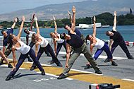 US Navy 060627-N-5290S-109 Gilad of the Fit TV show, Bodies in Motion, films a show aboard the amphibious assault ship USS Bonhomme Richard (LHD 6). Sailors participated in the filming on the flight deck during Rim of the Pacif