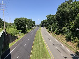 2021-07-23 11 13 17 View west along U.S. Route 46 from the overpass for the rail line between Dixon Drive and Lackawanna Avenue in Mountain Lakes, Morris County, New Jersey