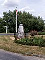 English flag and war memorial Henham Essex England