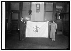 Harry S. New & Illinois flag, 2-26-24 LCCN2016848713